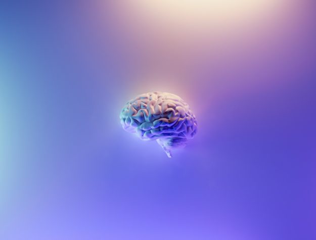 A brain floats in the center of a gradient purple background