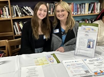 Mother/daughter volunteers Teresa and Juliana representing EDRC at the Lantern League event held at Presentation High School.