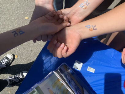 EDRCSV fake tattoos at the Scott's Valley Middle School Wellness Fair.